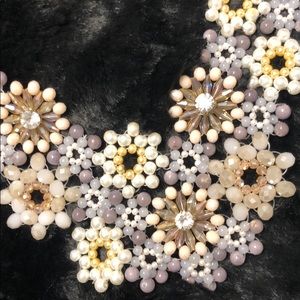 Francesca’s white beaded necklace